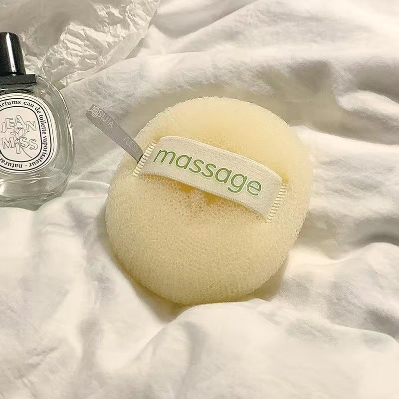 Două în unu: plasă spumantă pentru baie și minge de baie cu aspect floral