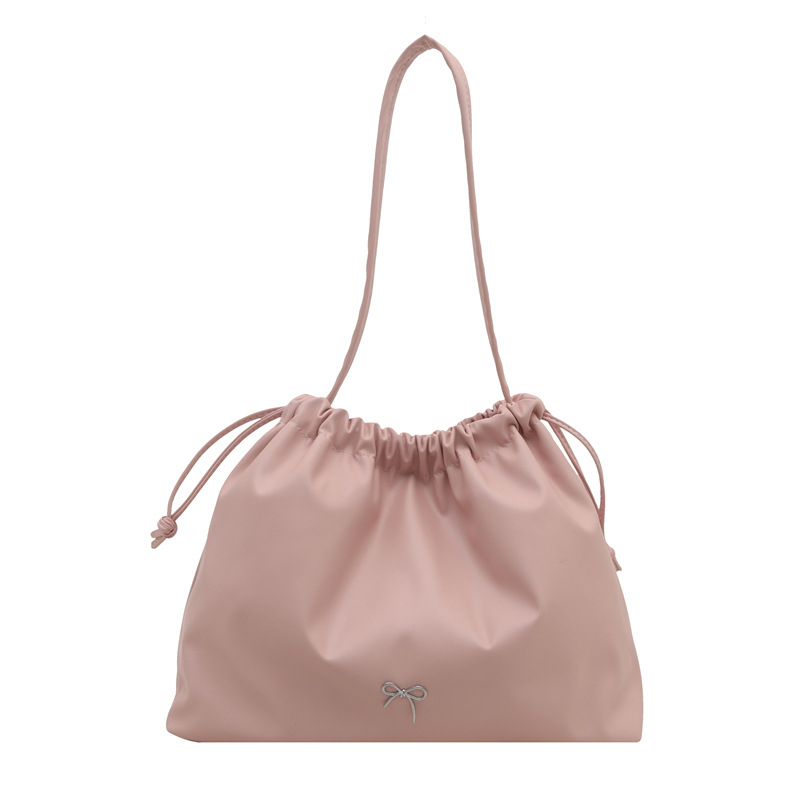 2026 novi model ženske torbe sa šnimi, velika kapaciteta, jednofarbna, za ramena ili crossbody, leptirov oblik dizajna