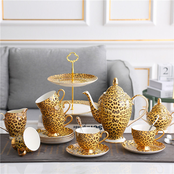 Set cafea din porțelan de oase cu imprimeu leopard: cană cu farfurie, ceainic, linguriță, zaharniță, cană de lapte, farfurie, suport de masă, cuțit, furculiță, cenușar