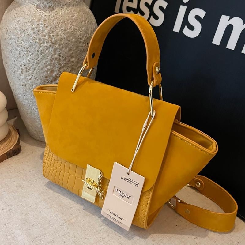 Retro mat torba s lancem preko ramena, krilastog oblika, model 2025