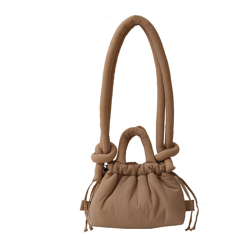 Ženska bucket bag u bombon boji, mala nylon torba sa šnrom za nošenje preko ramena