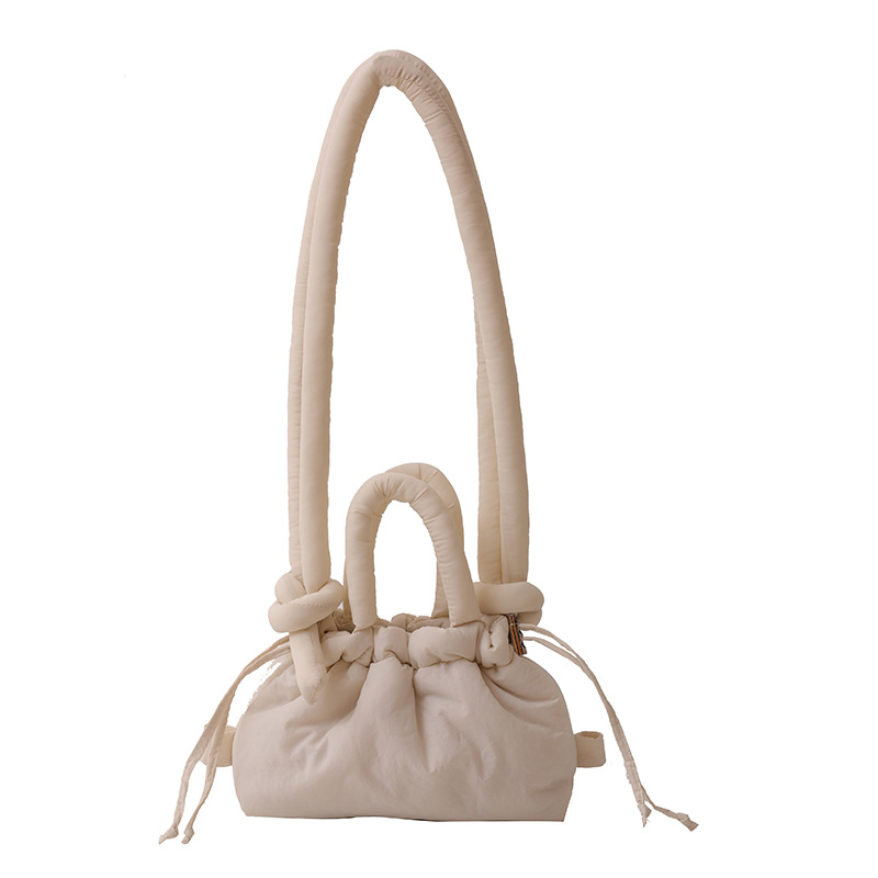 Ženska bucket bag u bombon boji, mala nylon torba sa šnrom za nošenje preko ramena