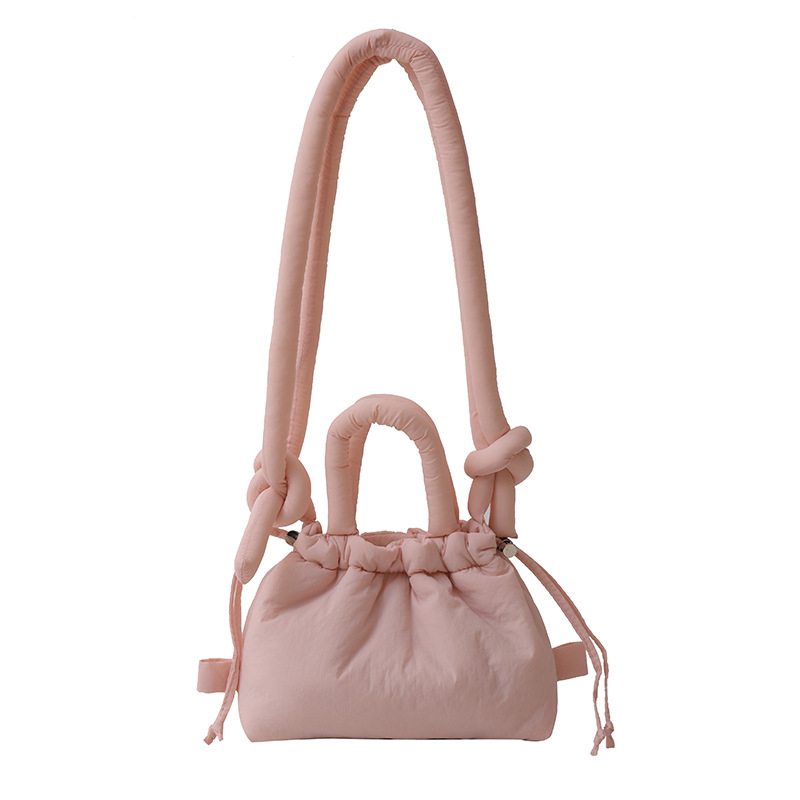 Ženska bucket bag u bombon boji, mala nylon torba sa šnrom za nošenje preko ramena