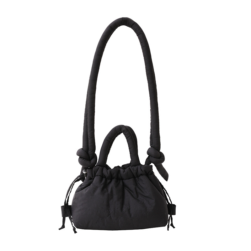 Ženska bucket bag u bombon boji, mala nylon torba sa šnrom za nošenje preko ramena