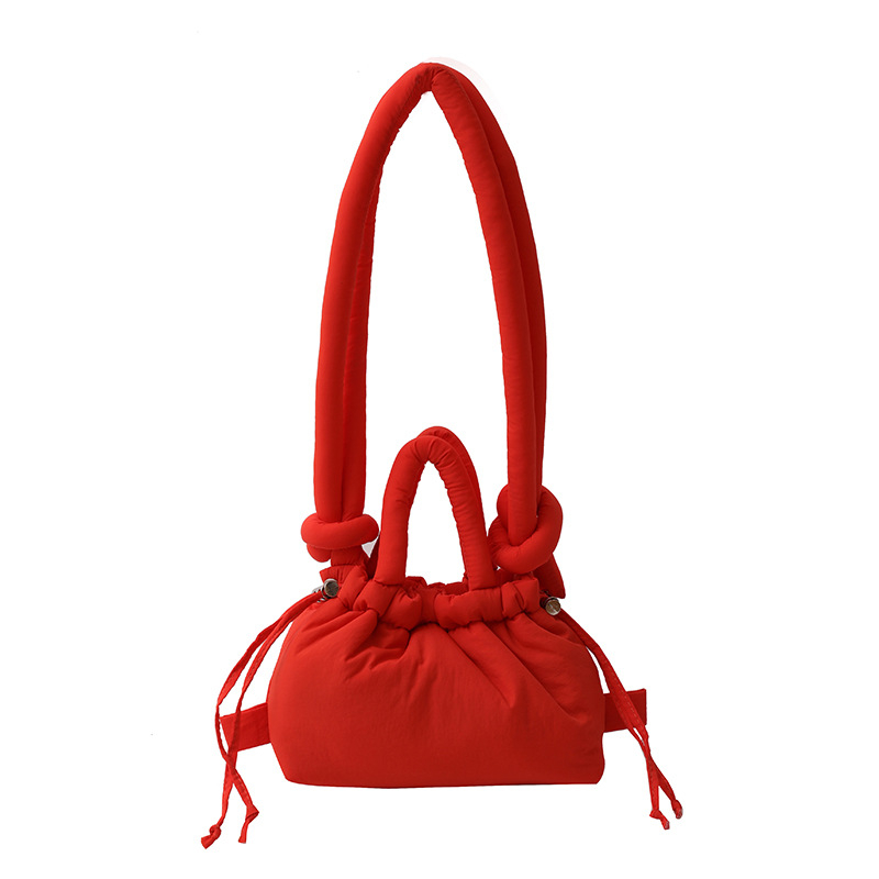 Ženska bucket bag u bombon boji, mala nylon torba sa šnrom za nošenje preko ramena