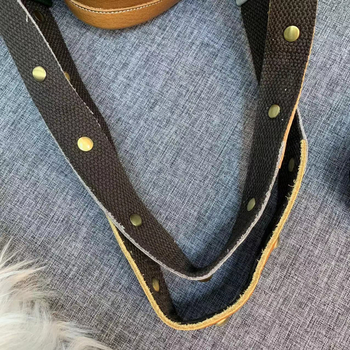 Ženska torba od prave kože, bucket stil, color-block dizajn i metalne niti, na ramenu