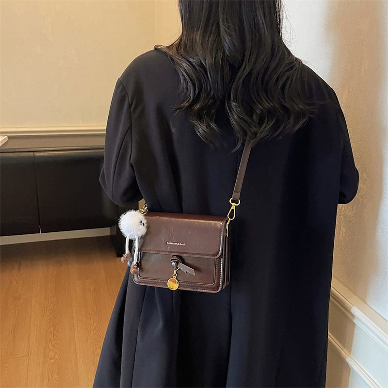 2025 nova ženska crossbody torba – kompaktna kvadratna torba s retro teksturom