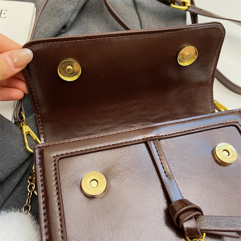 2025 nova ženska crossbody torba – kompaktna kvadratna torba s retro teksturom