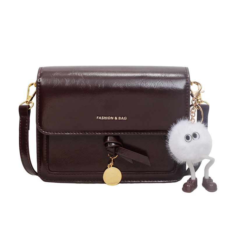 2025 nova ženska crossbody torba – kompaktna kvadratna torba s retro teksturom
