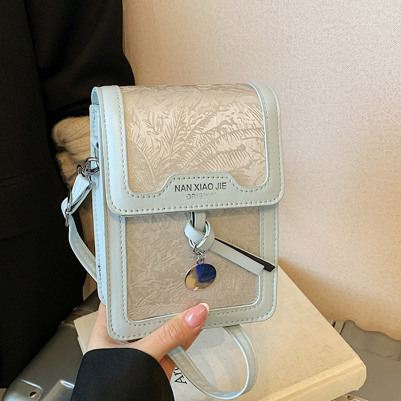 Ženska PU mala kvadratna crossbody torbica — minimalistički i luksuzan stil, s pretincem za telefon, ljeto 2025