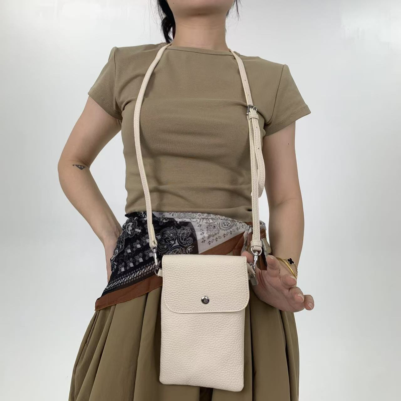 Ženska mini kožna crossbody torba s džepom za novčiće i telefon