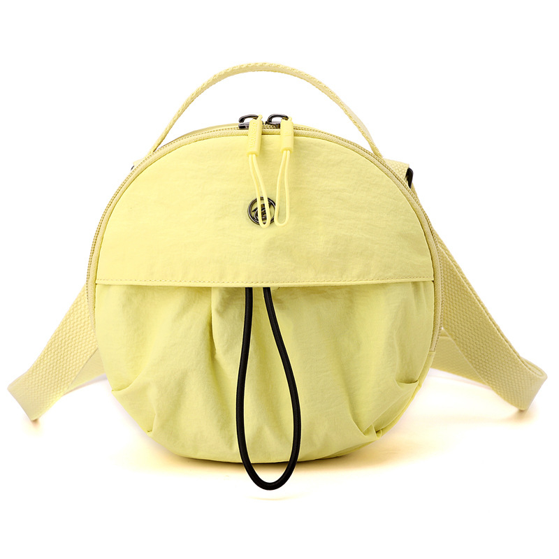 Najlon crossbody torba, lagana, mala okrugla forma, japanski stil, jednostavna ženska torba, jesen 2025