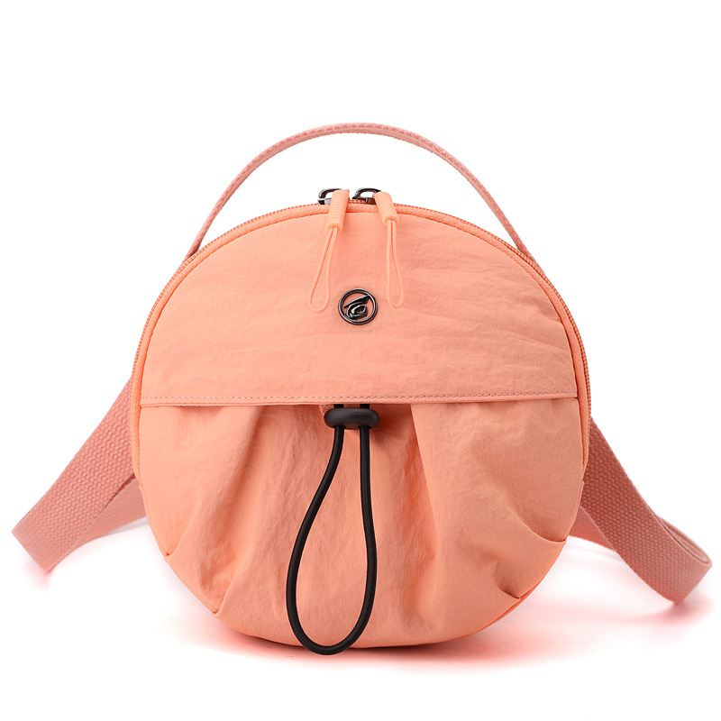 Najlon crossbody torba, lagana, mala okrugla forma, japanski stil, jednostavna ženska torba, jesen 2025