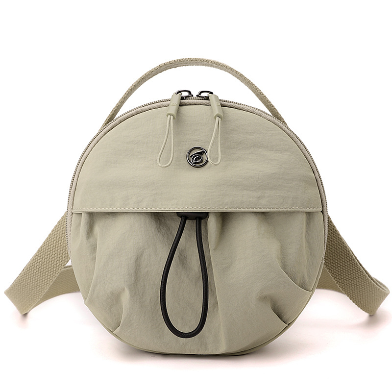 Najlon crossbody torba, lagana, mala okrugla forma, japanski stil, jednostavna ženska torba, jesen 2025