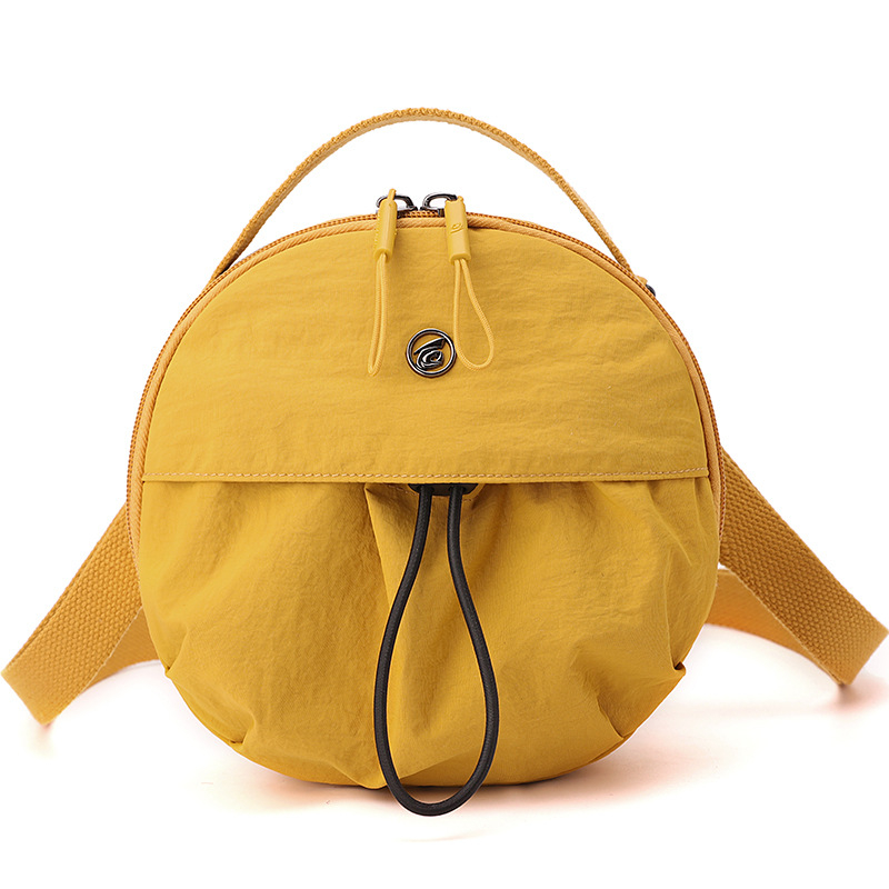 Najlon crossbody torba, lagana, mala okrugla forma, japanski stil, jednostavna ženska torba, jesen 2025