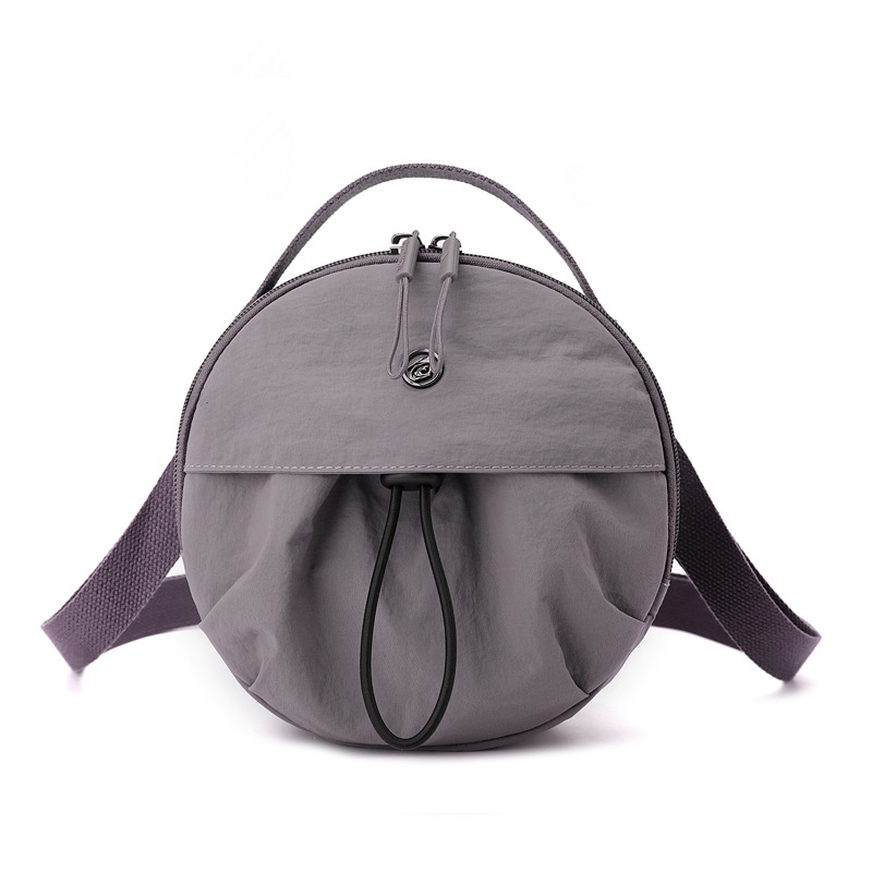 Najlon crossbody torba, lagana, mala okrugla forma, japanski stil, jednostavna ženska torba, jesen 2025