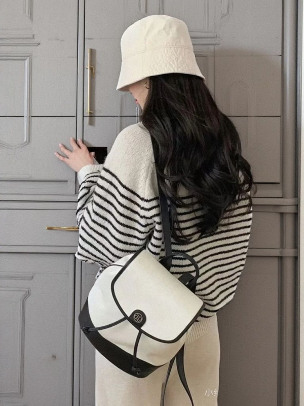 Ženski ruksak s crno-bijelim patchworkom, minimalistički gradski stil, svakodnevna torba