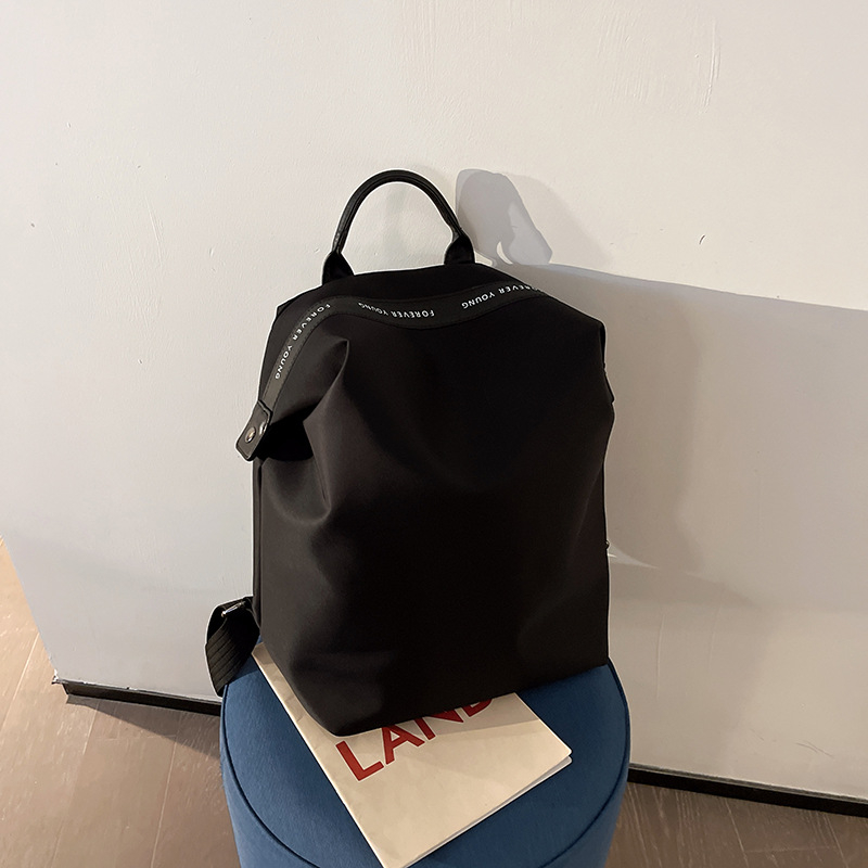 2026 korejski stil, svestran ruksak od najlona i platna, jednostavan dizajn, vodootporan, 20–35 L, kompatibilan s 12-inčnim prijenosnim računalom, unisex