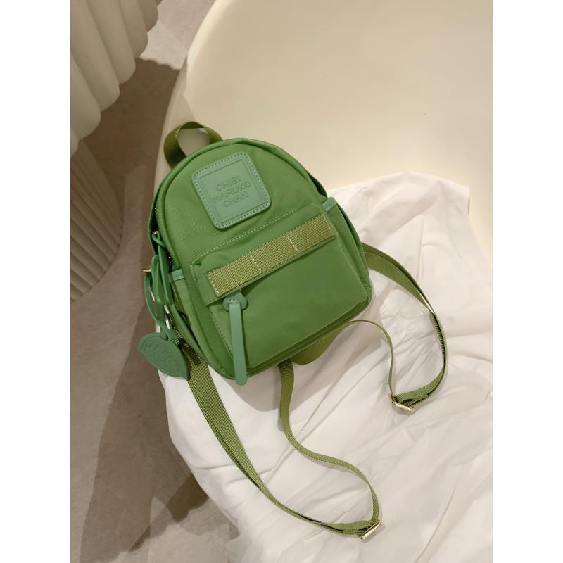 Moonlight Island 2024 ženski kompaktni casual ruksak s crossbody remenom i ručkom