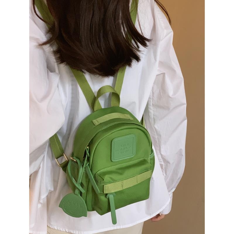 Moonlight Island 2024 ženski kompaktni casual ruksak s crossbody remenom i ručkom