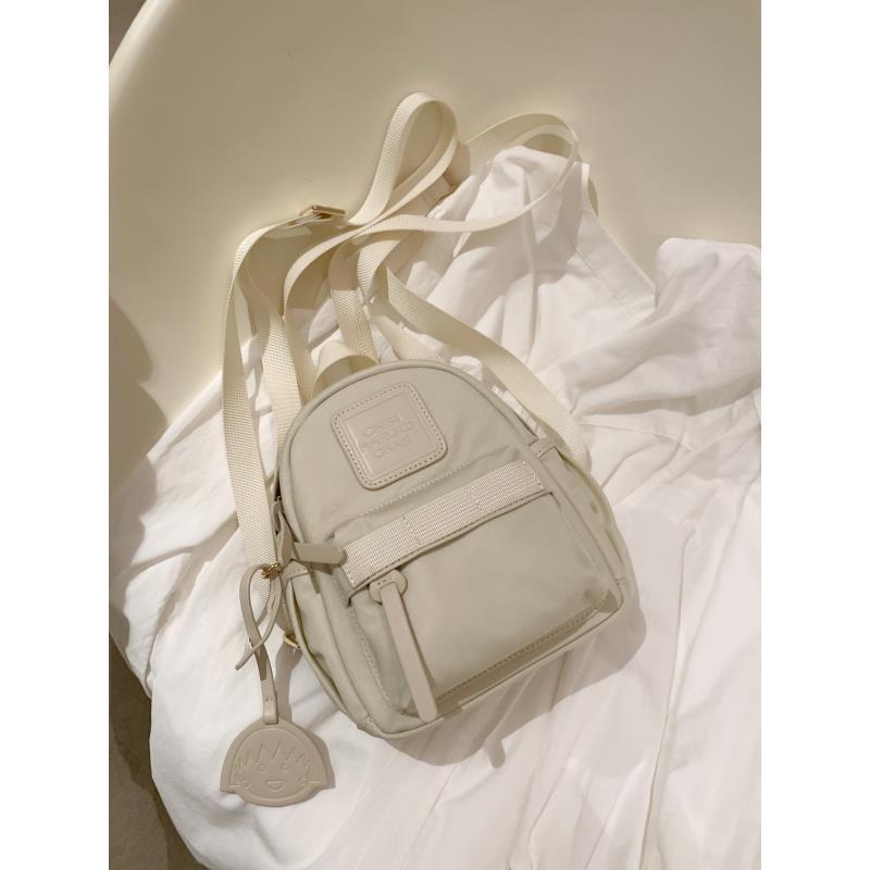 Moonlight Island 2024 ženski kompaktni casual ruksak s crossbody remenom i ručkom