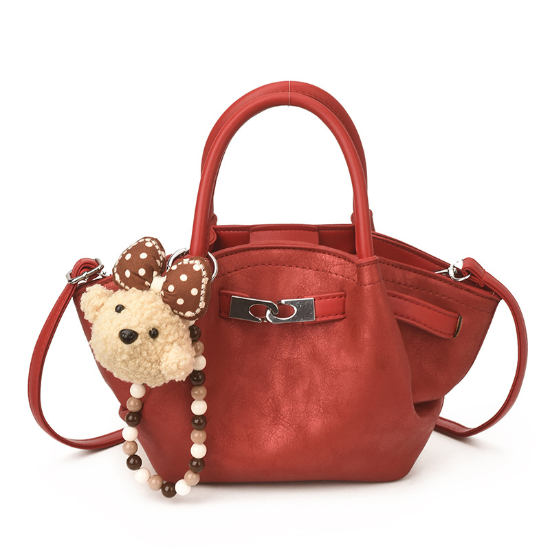 Ženska proljetna teksturirana torbica, mala košarasta PU torba, crossbody stil, novi model 2026