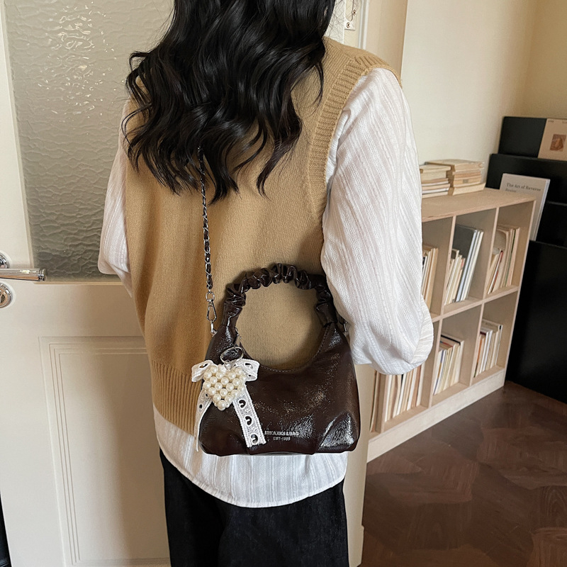 Torba u korejskom stilu s dizajnom oblaka za žene, 2026 novi model, kompaktna crossbody torba s lancem