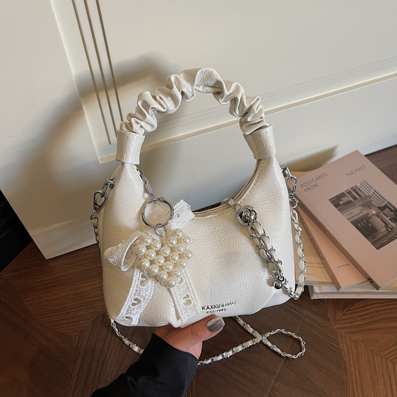 Torba u korejskom stilu s dizajnom oblaka za žene, 2026 novi model, kompaktna crossbody torba s lancem