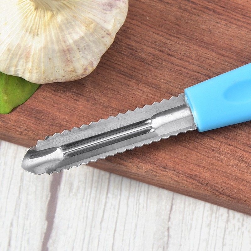 Instrument de bucătărie din oțel inoxidabil, multifuncțional pentru decojit fructe și legume și răzuitor pentru solzi de pește.