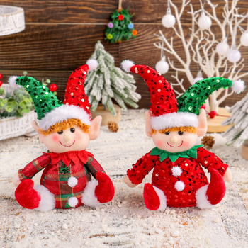Păpușă drăguță de Crăciun, așezată, ornament pentru vitrină, cu pălărie cu paiete Rudolph