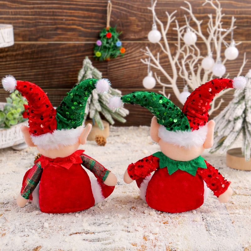 Păpușă drăguță de Crăciun, așezată, ornament pentru vitrină, cu pălărie cu paiete Rudolph