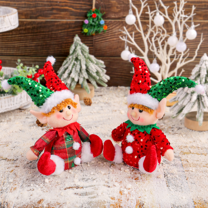 Păpușă drăguță de Crăciun, așezată, ornament pentru vitrină, cu pălărie cu paiete Rudolph