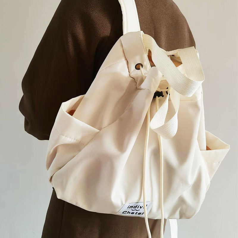 Minimalistička platnena ruksak velikog kapaciteta, svakodnevni ženski ruksak s vezicama, jednobojan, svestran i elegantan