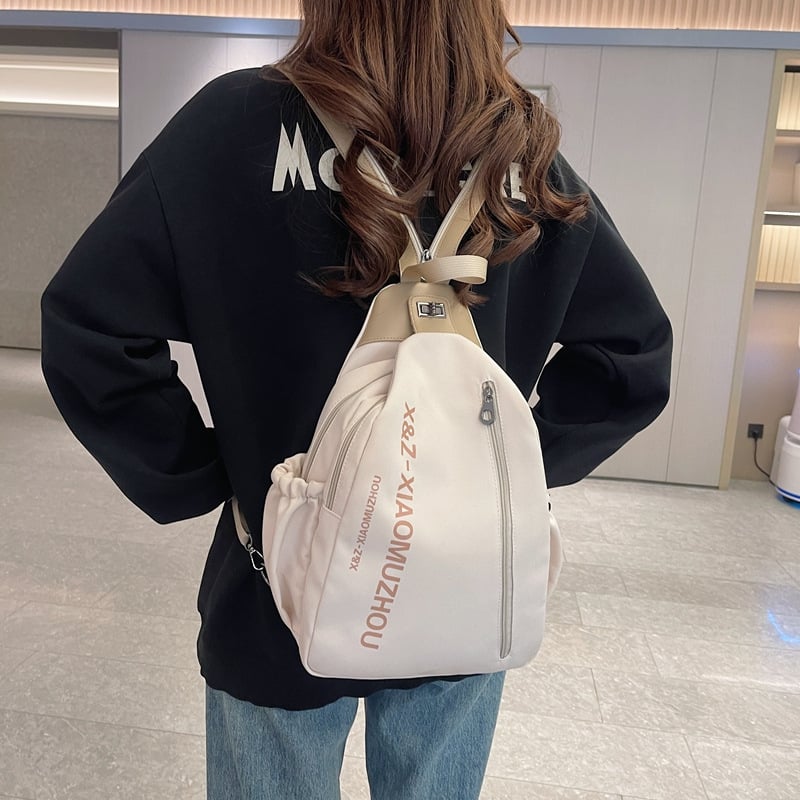 Ženska platnena torba s više pretinaca, višenamjenski ruksak ili crossbody torba za svakodnevnu upotrebu.