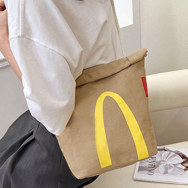 Moderna i svestrana platnena torba s crossbody remenom, pogodna za učenike, dodatnu nastavu i putovanja, velik kapacitet