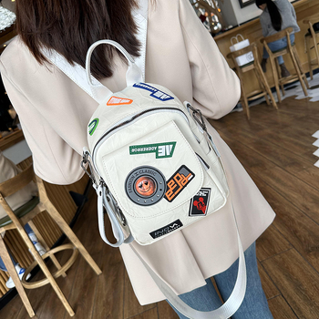 Stilizirani ruksak s retro japansko-korejskim Harajuku stilom, vrhunski plisirani dizajn značke, meka ženska torba od PU materijala