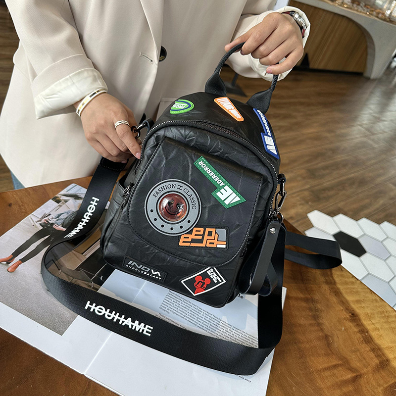 Stilizirani ruksak s retro japansko-korejskim Harajuku stilom, vrhunski plisirani dizajn značke, meka ženska torba od PU materijala