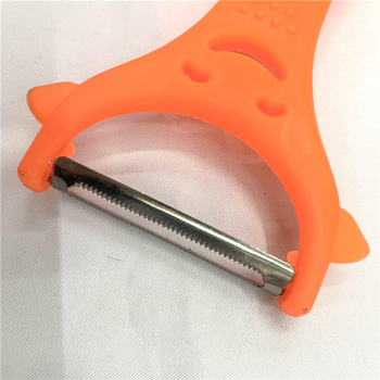 Peeler din oțel inoxidabil, mâner din plastic, cu față zâmbitoare – pentru fructe și legume