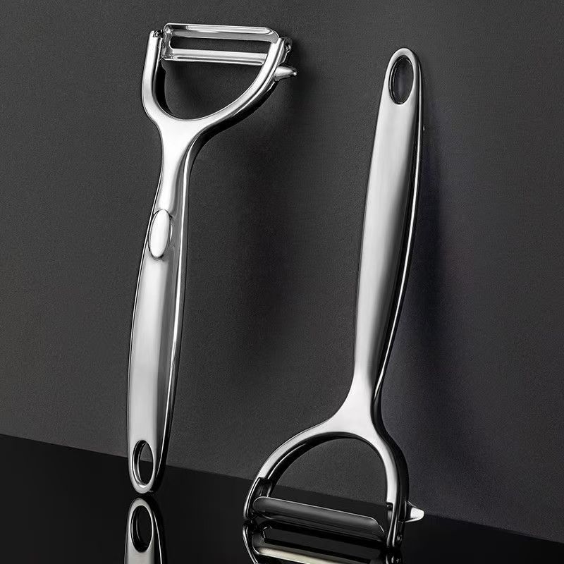 Peeler de bucătărie din oțel inoxidabil, multifuncțional, pentru uz casnic, potrivit pentru curățarea cartofilor, merelor și a altor fructe și legume.
