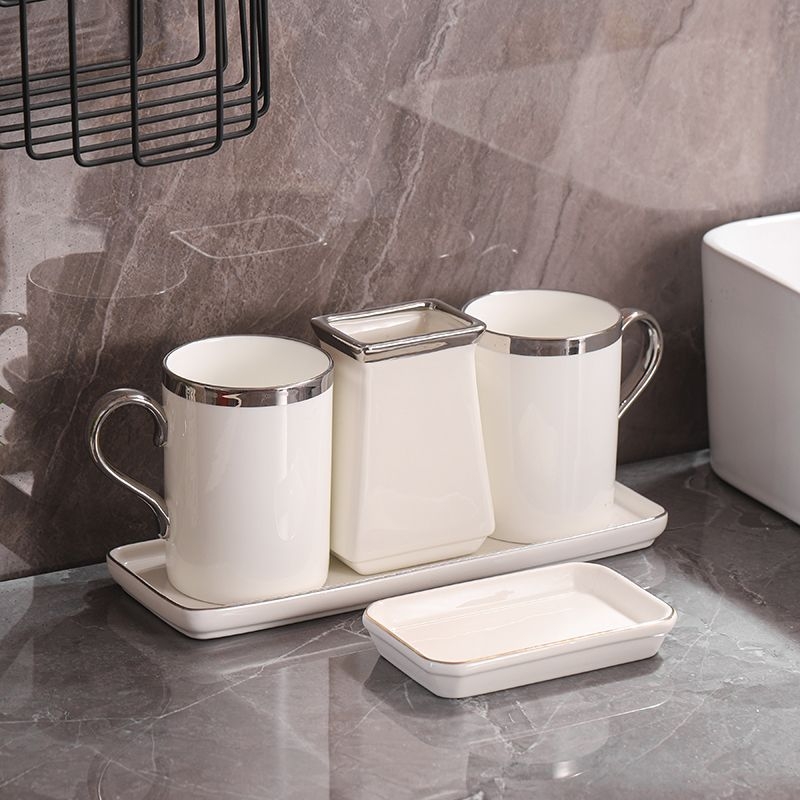 Set din două cești ceramice pentru periute de dinți, cu suport de depozitare