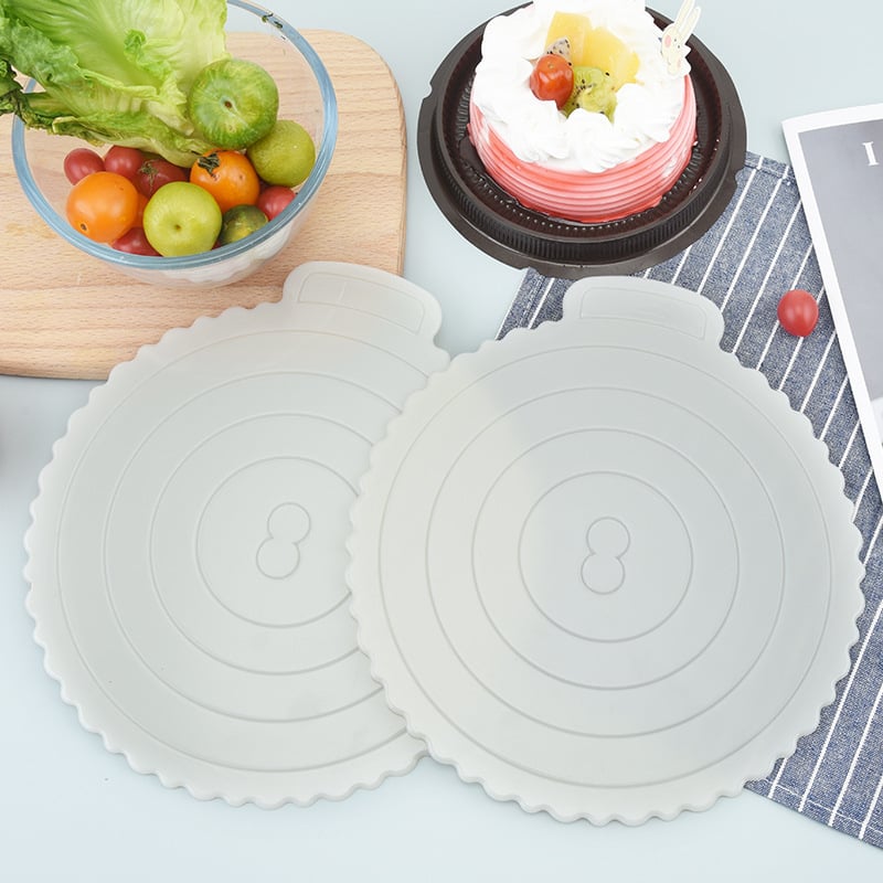 Covoraș alb pentru tort din ABS plastic, gros, circular de 10 inci, lavabil și reutilizabil.