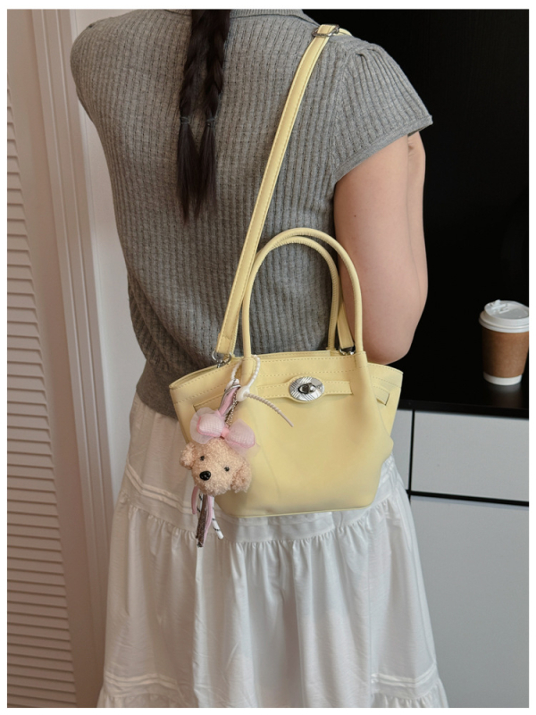 Ženska torbica s dizajnom krila, novi model 2026, gradski minimalistički stil, svestrana torbica za rame i crossbody, PU koža, srednja veličina