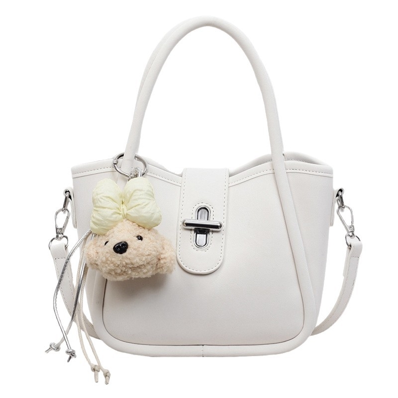 Minimalistička ženska torba na rame s crossbody remenom, 2026 nova moda, kompaktna torba u obliku kante s dizajnom inspiriranim krilima