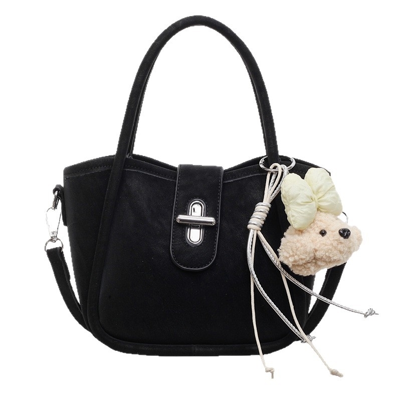 Minimalistička ženska torba na rame s crossbody remenom, 2026 nova moda, kompaktna torba u obliku kante s dizajnom inspiriranim krilima