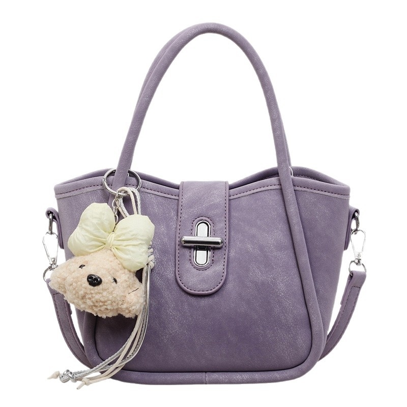 Minimalistička ženska torba na rame s crossbody remenom, 2026 nova moda, kompaktna torba u obliku kante s dizajnom inspiriranim krilima