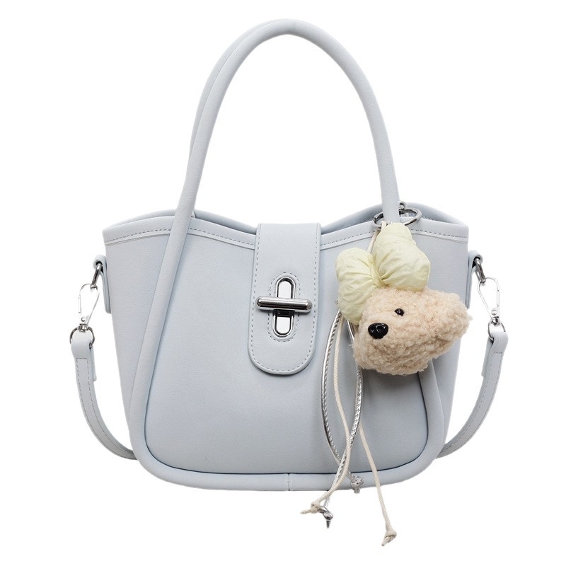 Minimalistička ženska torba na rame s crossbody remenom, 2026 nova moda, kompaktna torba u obliku kante s dizajnom inspiriranim krilima