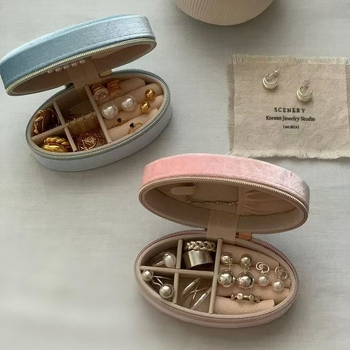 Ovalna kutija za nakit s flanelnom unutrašnjošću, prenosna, retro dizajn s zatvaračem, dimenzije 10.8 × 5.8 × 4.6 cm