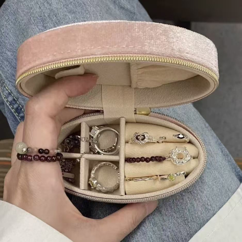 Ovalna kutija za nakit s flanelnom unutrašnjošću, prenosna, retro dizajn s zatvaračem, dimenzije 10.8 × 5.8 × 4.6 cm