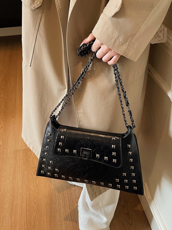 Ženska torba s metalnim zakovicama, novi model 2025, svestrana torba za rame ili crossbody, u stilu kovert.