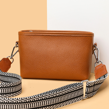 Női valódi bőr bucket táska széles vállpánttal, minimalista crossbody, 2025-ös új modell.